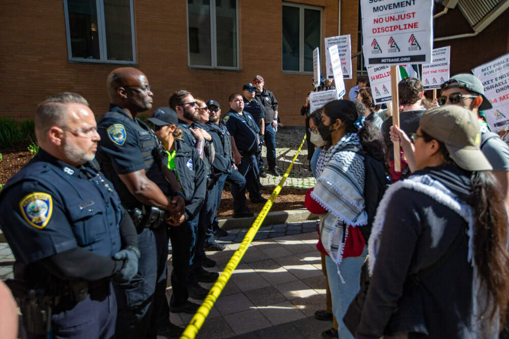 Police line up against MIT students protesting the war in Gaza in May 2024. (Jesse Costa/WBUR)