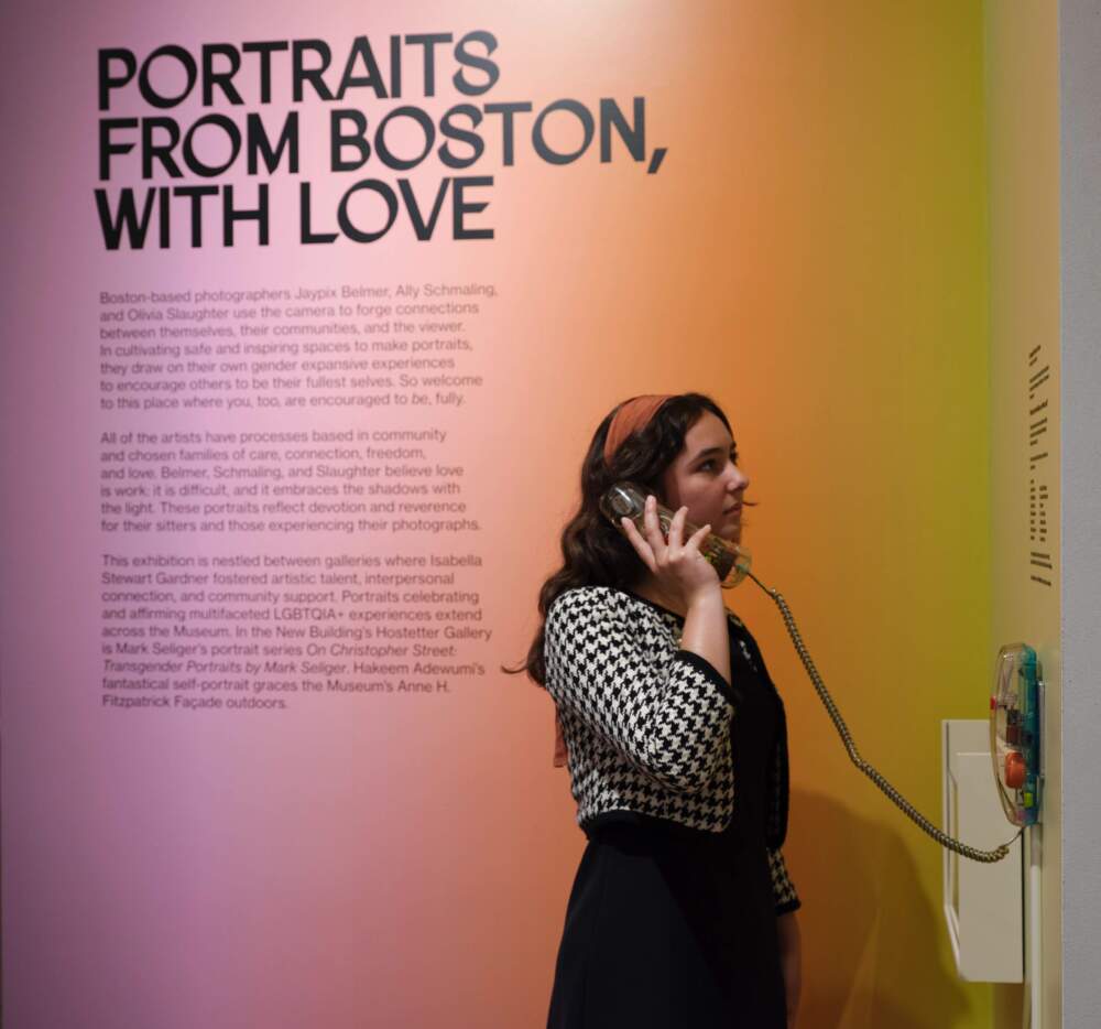 A visitor listening to a message from the &quot;Community Voices Phone&quot; by Crystal Bi. (Courtesy Isabella Stewart Gardner Museum)