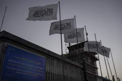 Taliban flags flutter at the airport in Kabul, Afghanistan, Thursday, Sept. 9, 2021. (Bernat Armangue/AP)