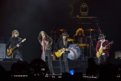 From left: Tom Hamilton, Steven Tyler, Joe Perry, John Douglas and Brad Whitford of Aerosmith perform on Sept. 8, 2022, at Fenway Park in Boston. (Winslow Townson/Invision/AP)