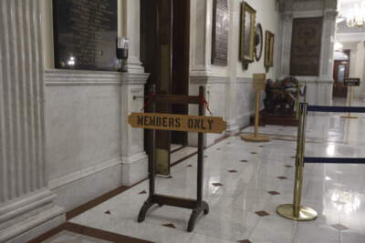 A sign blocks access to the public at the entrance to the House of Representatives at the Massachusetts State House. (Mary Schwalm/AP)