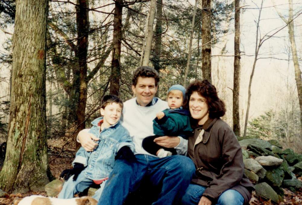 The author and her husband with their two young boys in 1994 — decades before ballroom dancing lessons . (Courtesy Molly M. Schpero)